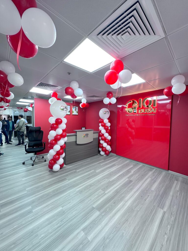 Corporate event decoration setup in Dubai with branding elements and stage design.